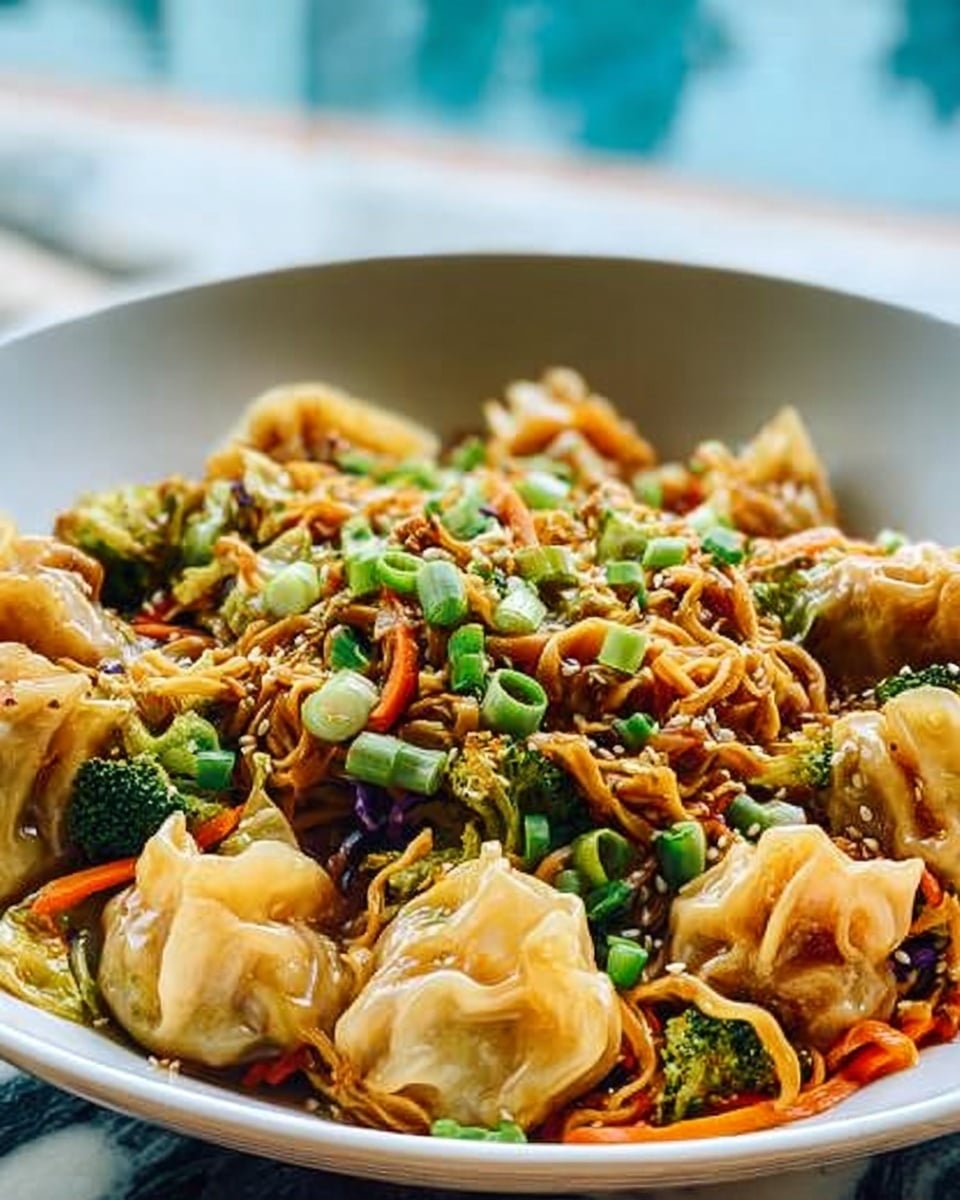 The image shows a close-up of a white bowl filled with a colorful Asian noodle dish. The base layer is light brown noodles mixed with bright orange carrot strips and dark green broccoli pieces. On top, there are golden-brown fried dumplings, sprinkled with light sesame seeds and chopped bright green onions. The dumplings have a slightly crispy texture, with some folds showing. The background is a white marbled surface. photo taken with an iphone --ar 4:5 --v 7